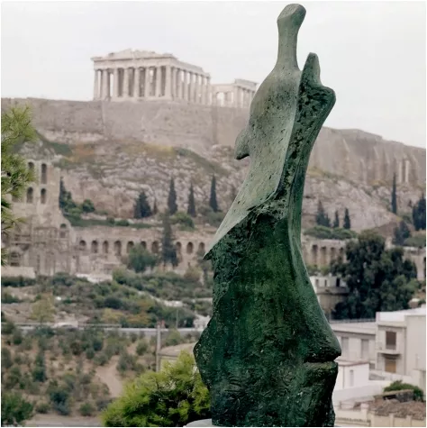 Henry Moore’s &quot;Standing Figure: Knife Edge&quot; (1961) installed on Philopappos Hill opposite the Acropolis as part of the First International Exhibition of Sculpture, Athens Festival, 1965