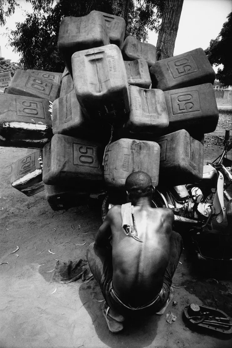 Romuald Hazoumè, "La Panne", 2004. Silver gelatin print on baryta paper mounted on Dibond. 47 1/4 x 31 1/2 inches (120 x 80 cm). Edition of 6 + 3 AP
