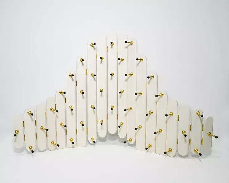 Ally Rosenberg, "Just a Phase". Skirting boards, door stoppers, magnolia emulsion, black enamel 90 x 50 x 50 cm, 2024