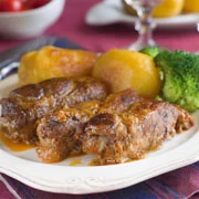 Αφέλια (χοιρινό μαγειρεμένο με κρασί και κόλιαντρο)