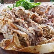 Κουνέλι στη λαδόκολλα γεμιστό με μαλάκα Χανίων, φρέσκο ανθότυρο, ξινομυζήθρα, βότανα και ξύσμα περγαμόντο